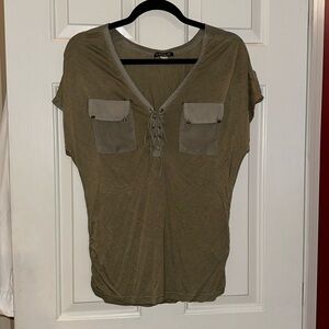 New condition, never worn!! Camo Green top by Venus, size M.